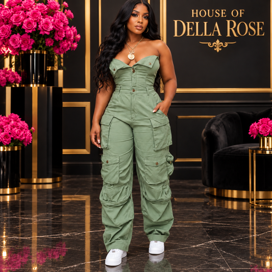 Green strapless cargo jumpsuit on Black model in House of Della Rose boutique