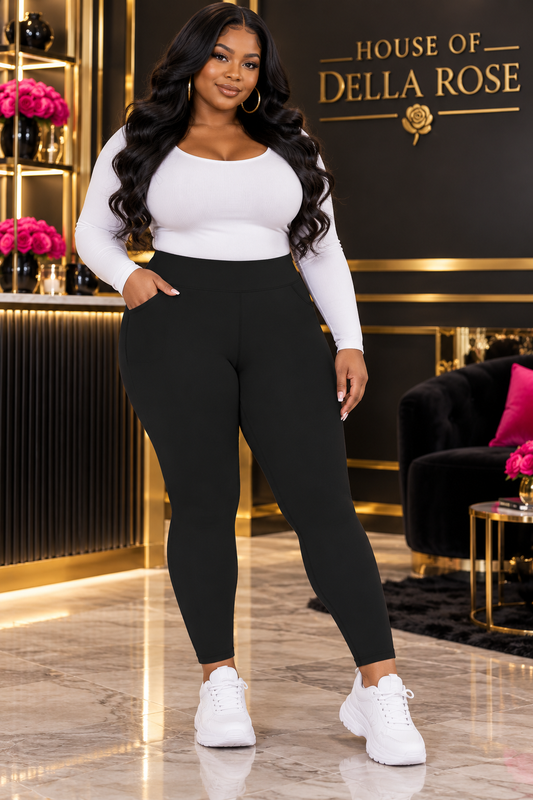 Black plus-size pocket leggings on a House of Della Rose model