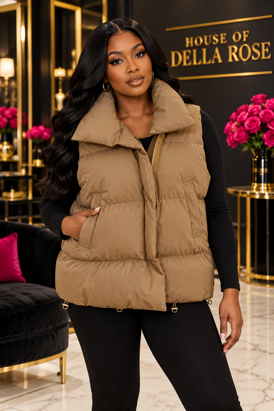 Khaki zip-front puffer vest with pockets on a House of Della Rose model